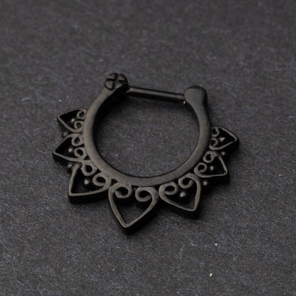 Black Ornate Septum Clicker on a dark background
