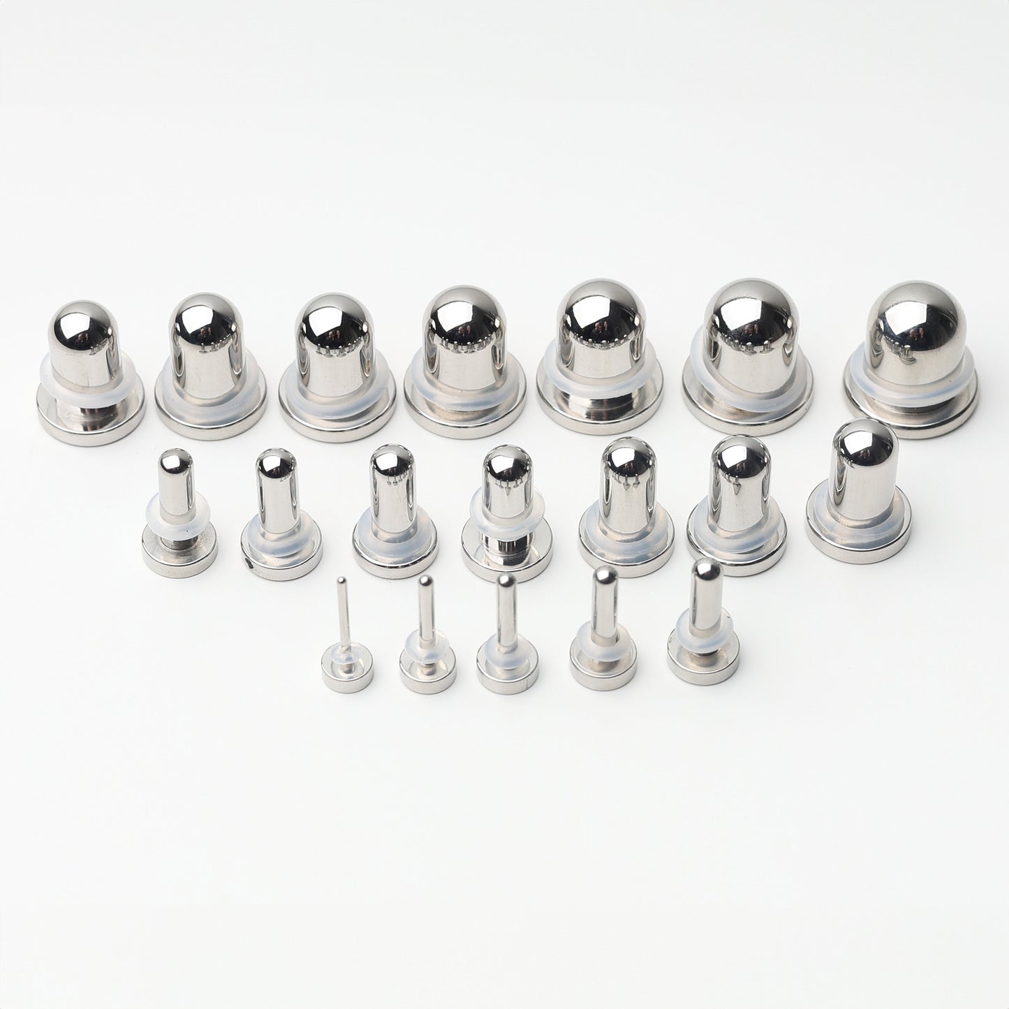 A complete dead stretching kit with polished stainless steel plugs and tunnels in multiple sizes, displayed on a white background.