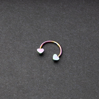 Rainbow Horsehoe hoop with heart ends in silver. 
