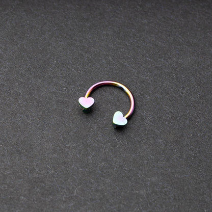 Rainbow Horsehoe hoop with heart ends in silver. 