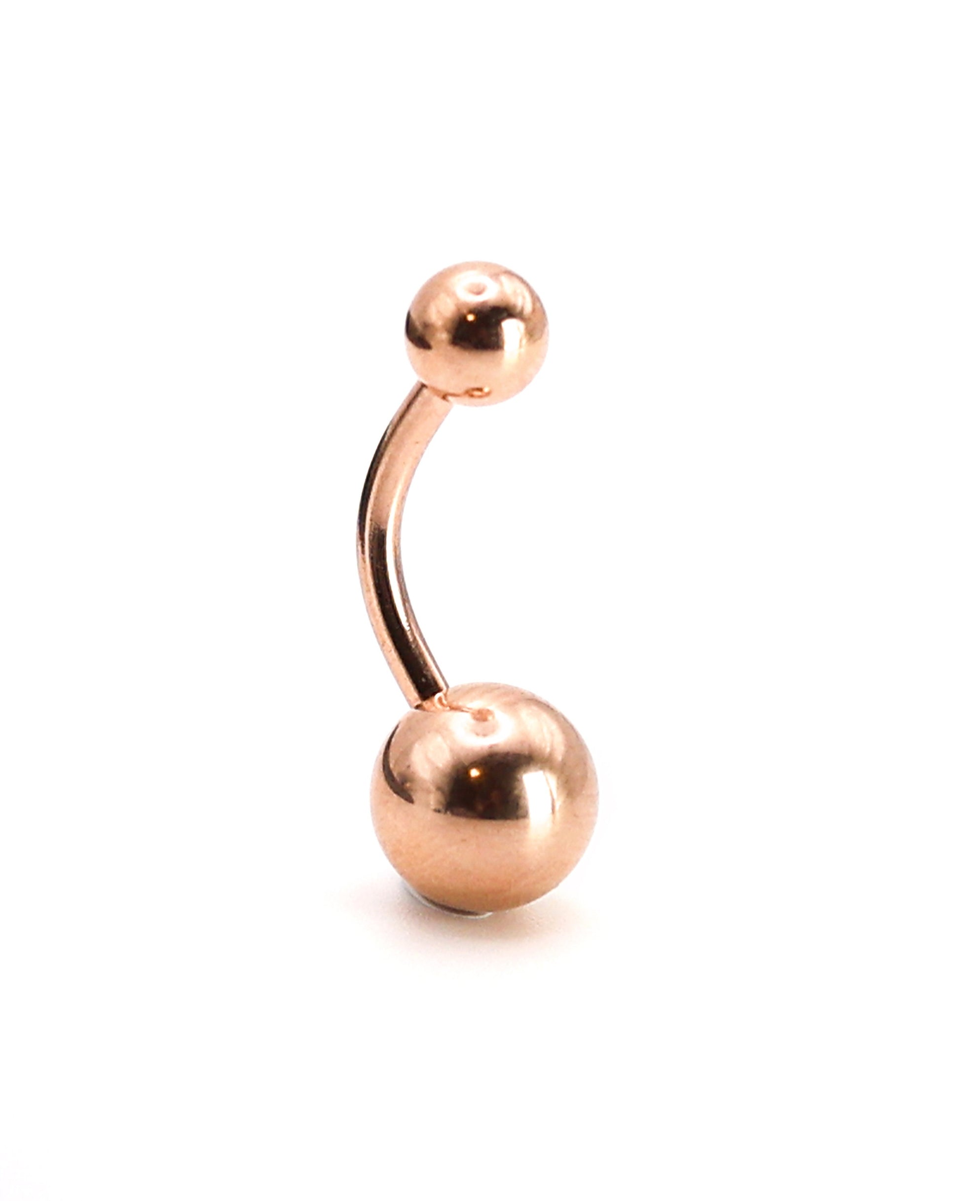 Stainless steel belly bar in rose gold displayed on a white background