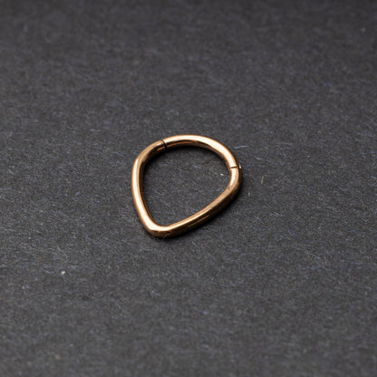 Rose Gold Teardrop Clicker displayed on a dark background